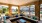 a living room with a large glass door