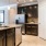 a kitchen with marble counters