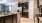 a kitchen with marble counters