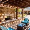 a spacious patio with lounge seating