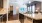 a kitchen with a marble counter top