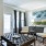 a living room with a large painting